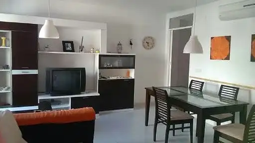Sala de estar de Piso en venta en La Ràpita con Aire acondicionado, Calefacción y Amueblado