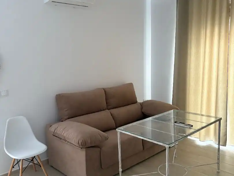 Sala d'estar de Pis per a compartir en Fuentes de Andalucía amb Aire condicionat, Calefacció i Moblat