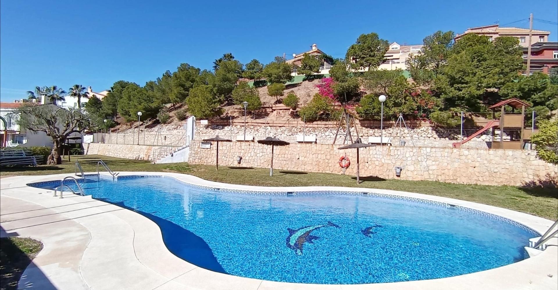 Piscina de Casa adosada en venda en Rincón de la Victoria amb Jardí privat, Terrassa i Piscina comunitària