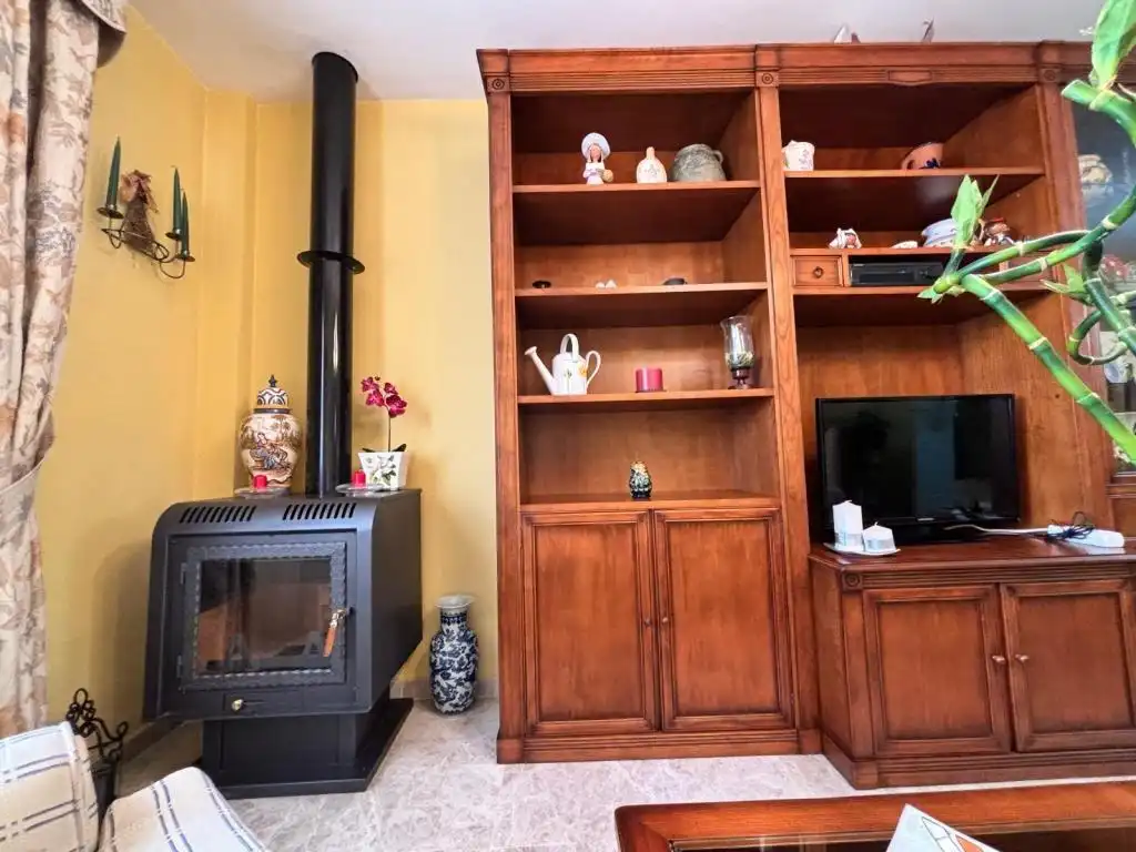 Sala de estar de Casa adosada de alquiler en Málaga con Aire acondicionado, Jardín privado y Amueblado
