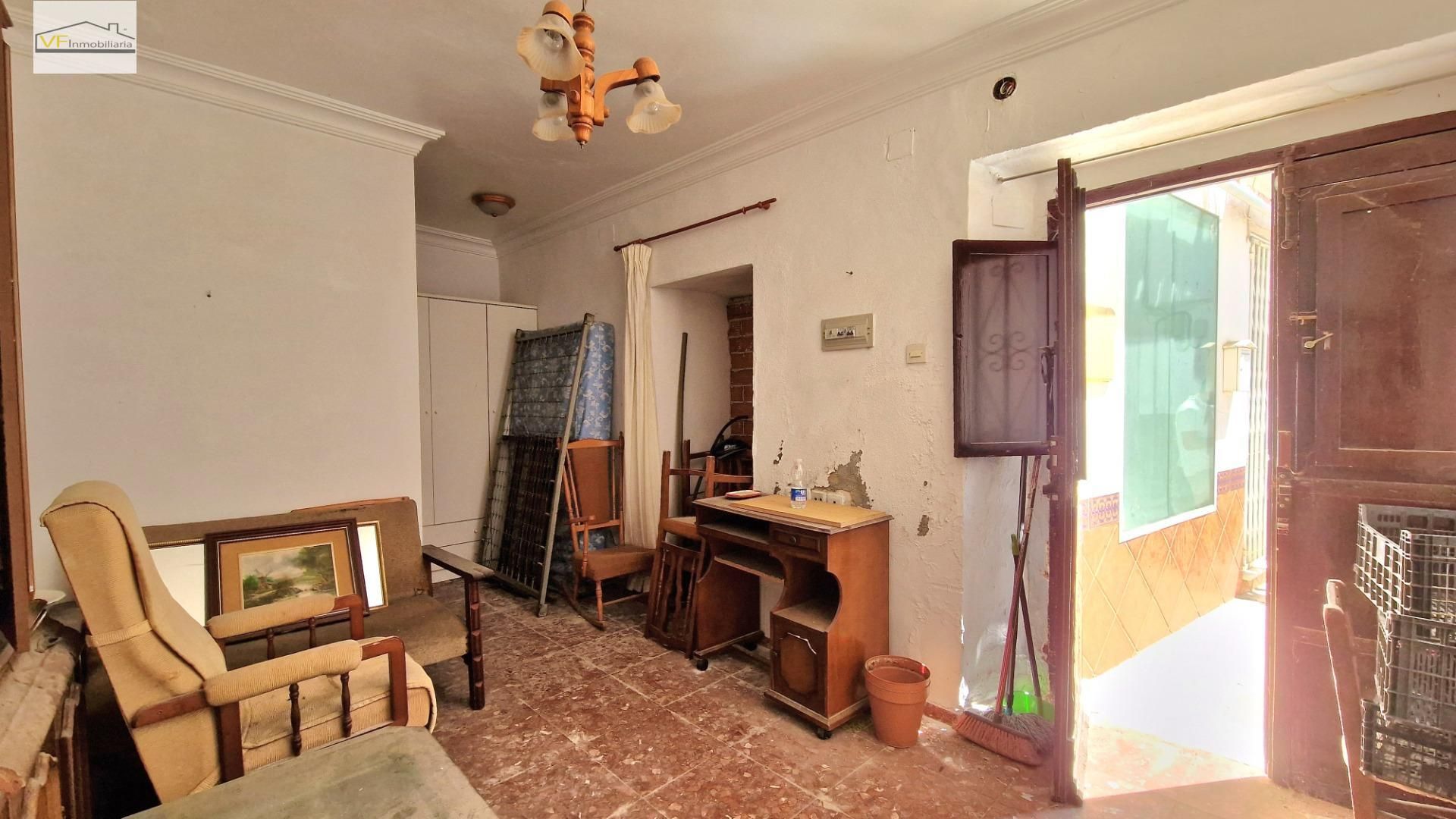 Sala d'estar de Casa adosada en venda en Almogía amb Traster i Balcó