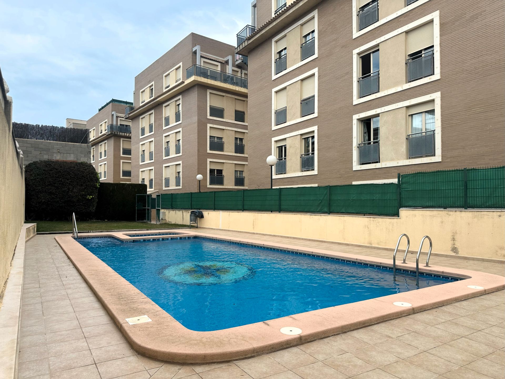 Swimming pool of Flat for sale in Pedreguer  with Air Conditioner, Storage room and Oven