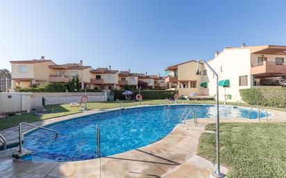 Swimming pool of Single-family semi-detached for sale in Salobreña  with Private garden, Parquet flooring and Terrace