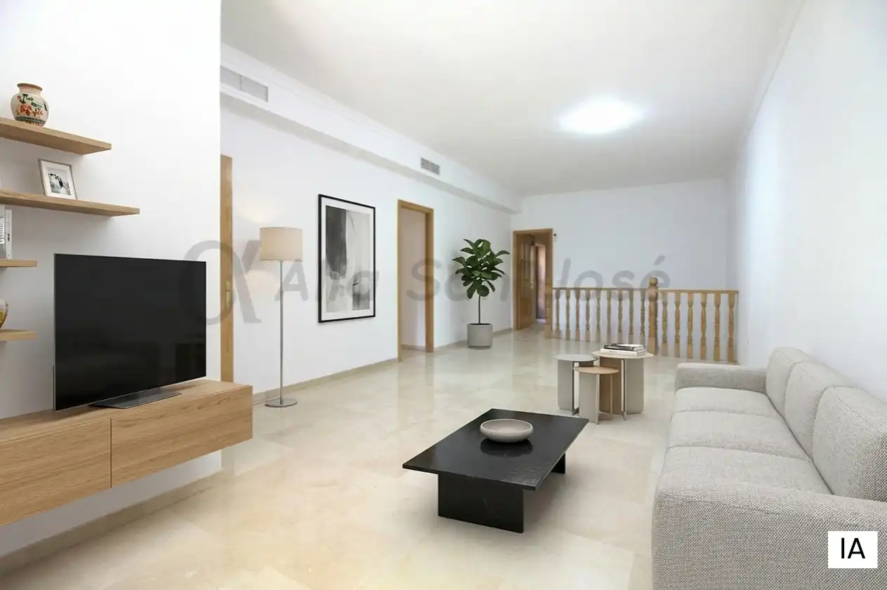 Sala d'estar de Casa adosada de lloguer en La Rinconada amb Balcó