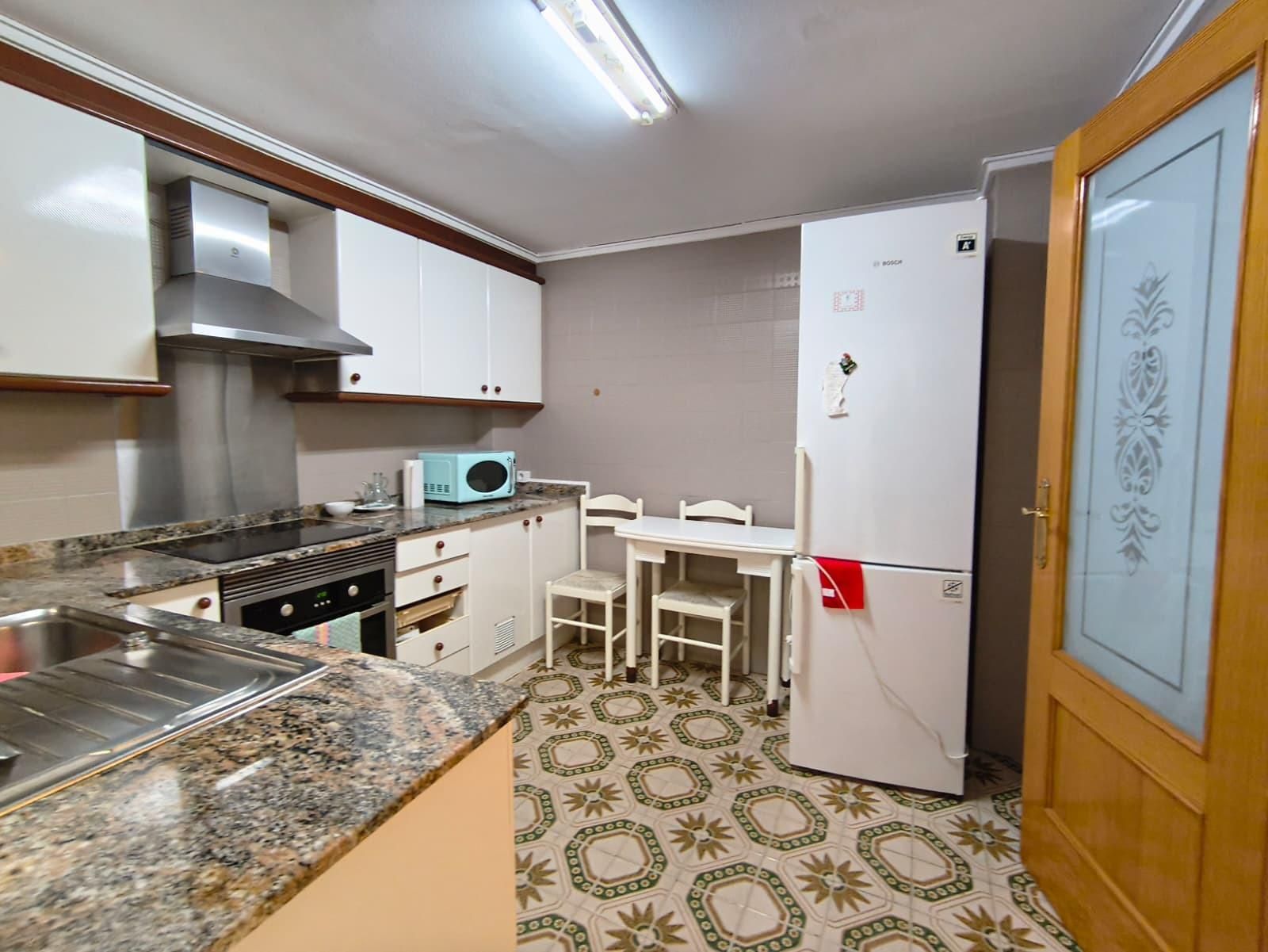 Kitchen of House or chalet to rent in Gandia  with Air Conditioner, Storage room and Alarm