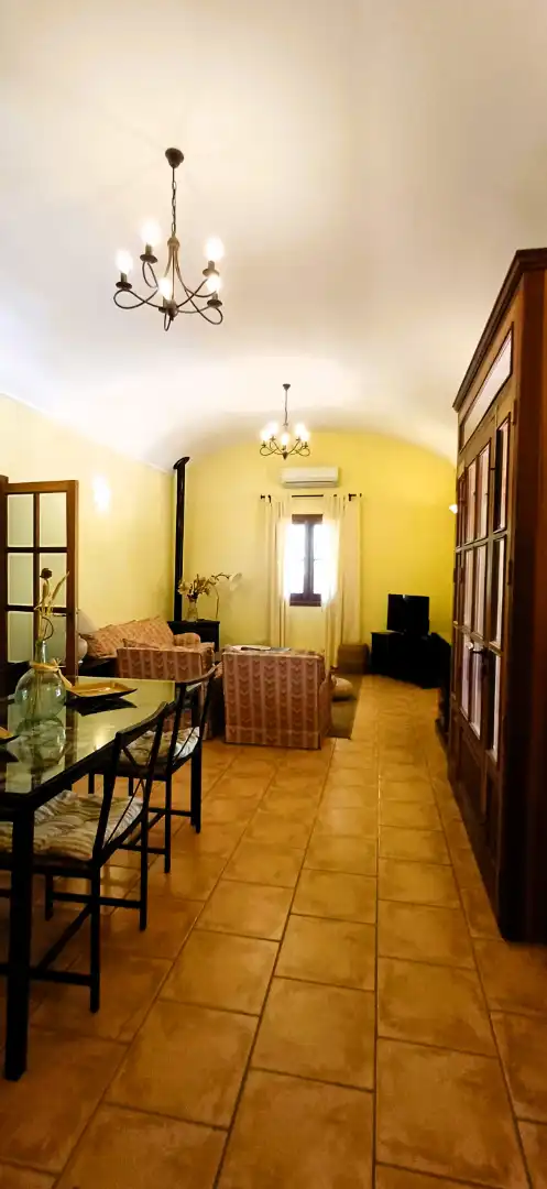 Sala de estar de Finca rústica de alquiler en Costitx con Aire acondicionado, Calefacción y Jardín privado