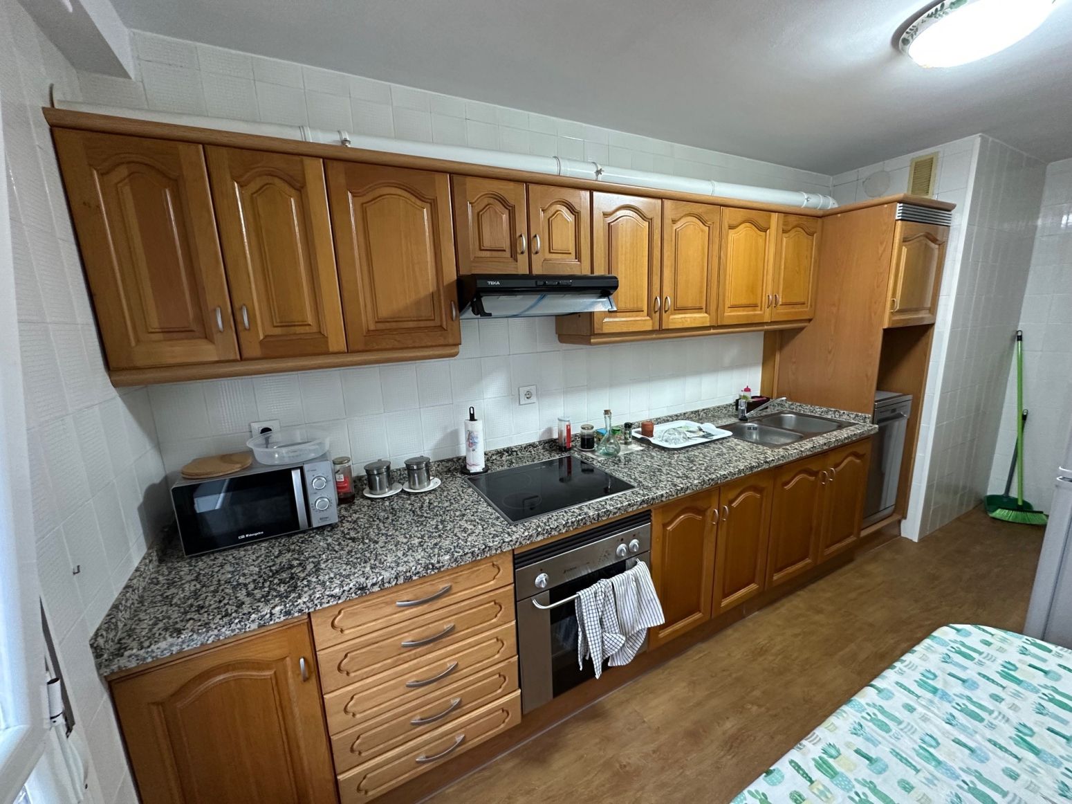 Kitchen of Flat for sale in Oviedo   with Heating, Parquet flooring and Storage room