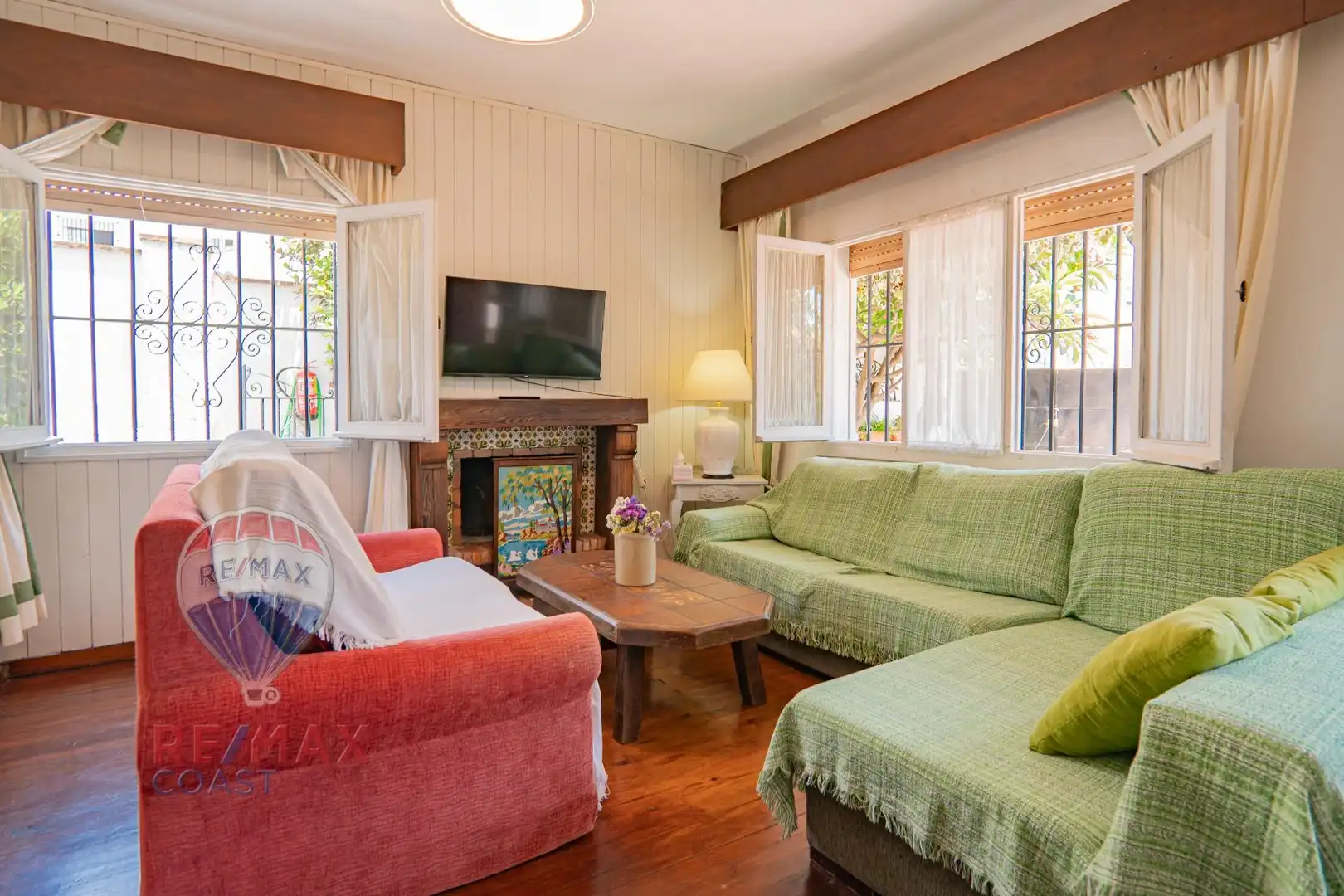 Sala de estar de Casa adosada en venta en Málaga con Aire acondicionado, Jardín privado y Terraza