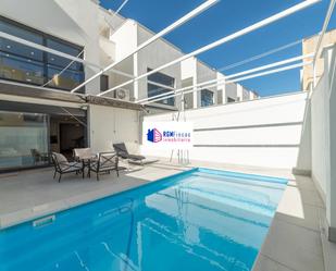 Swimming pool of Single-family semi-detached for sale in Alcalá de Guadaira  with Air Conditioner, Terrace and Swimming Pool