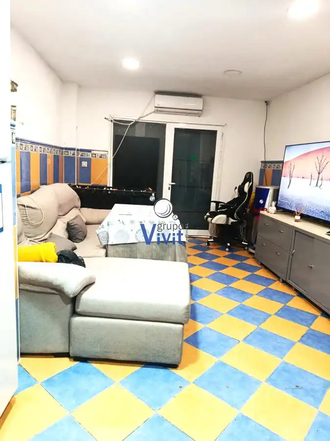 Sala de estar de Casa adosada en venta en Sevilla con Trastero