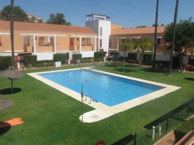 Piscina de Casa adosada de lloguer en La Antilla amb Terrassa i Moblat