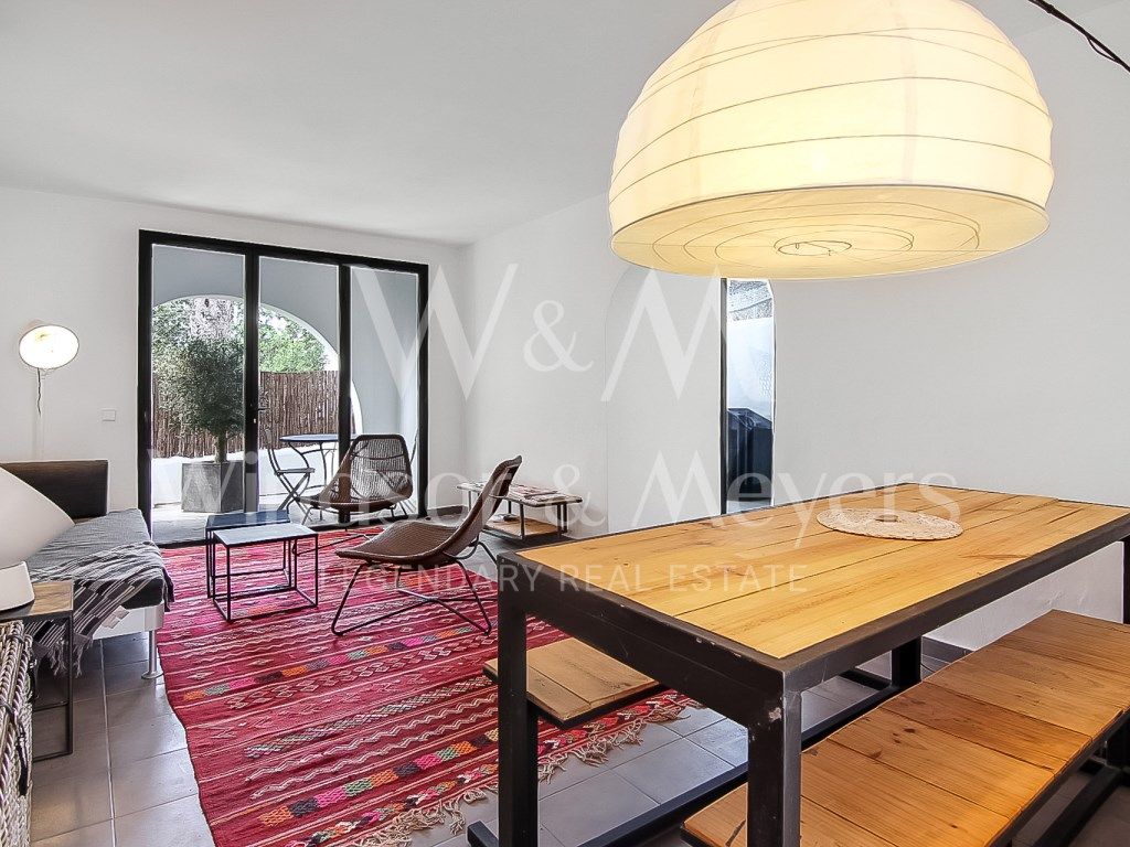 Sala d'estar de Apartament en venda en Sant Josep de sa Talaia amb Aire condicionat, Terrassa i Moblat