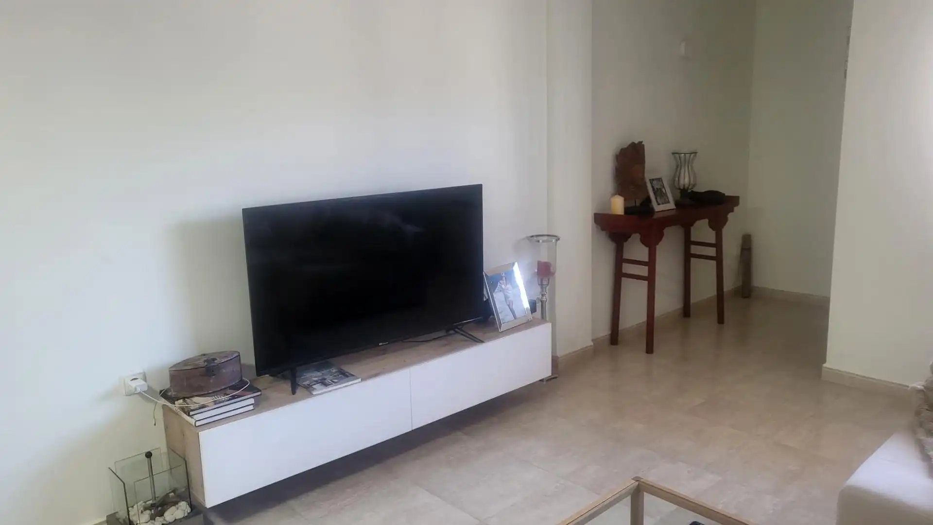 Sala d'estar de Casa adosada en venda en Elche / Elx amb Calefacció, Jardí privat i Moblat