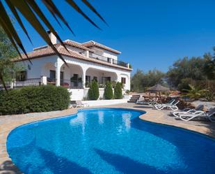 Vista exterior de Casa o xalet en venda en Periana amb Aire condicionat, Jardí privat i Terrassa