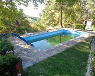 Swimming pool of House or chalet for sale in Navamorcuende  with Air Conditioner, Private garden and Storage room
