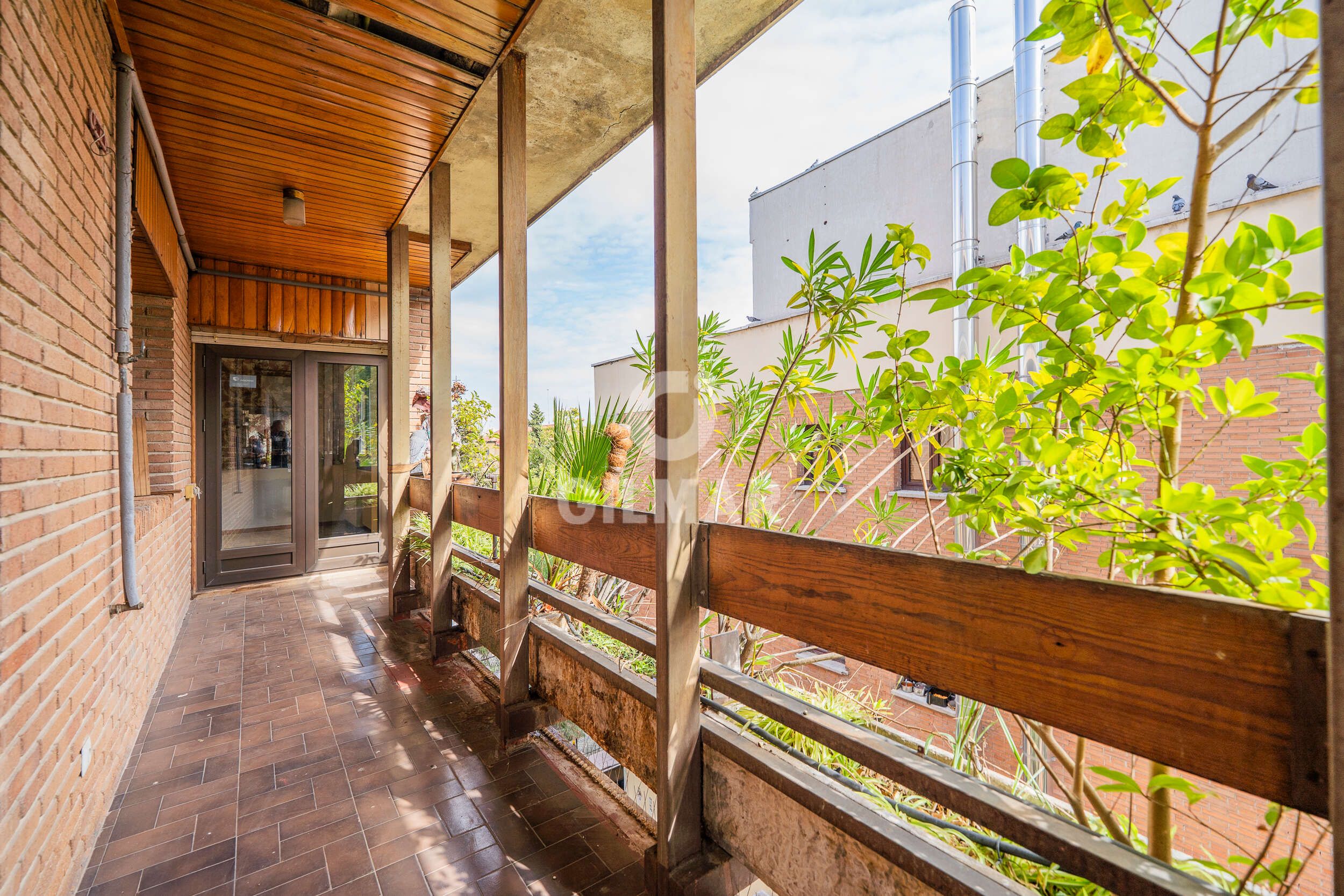 Exterior view of Flat for sale in  Madrid Capital  with Heating, Private garden and Storage room