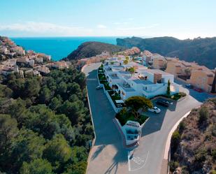 Exterior view of Single-family semi-detached for sale in Benitachell / El Poble Nou de Benitatxell  with Terrace and Community pool