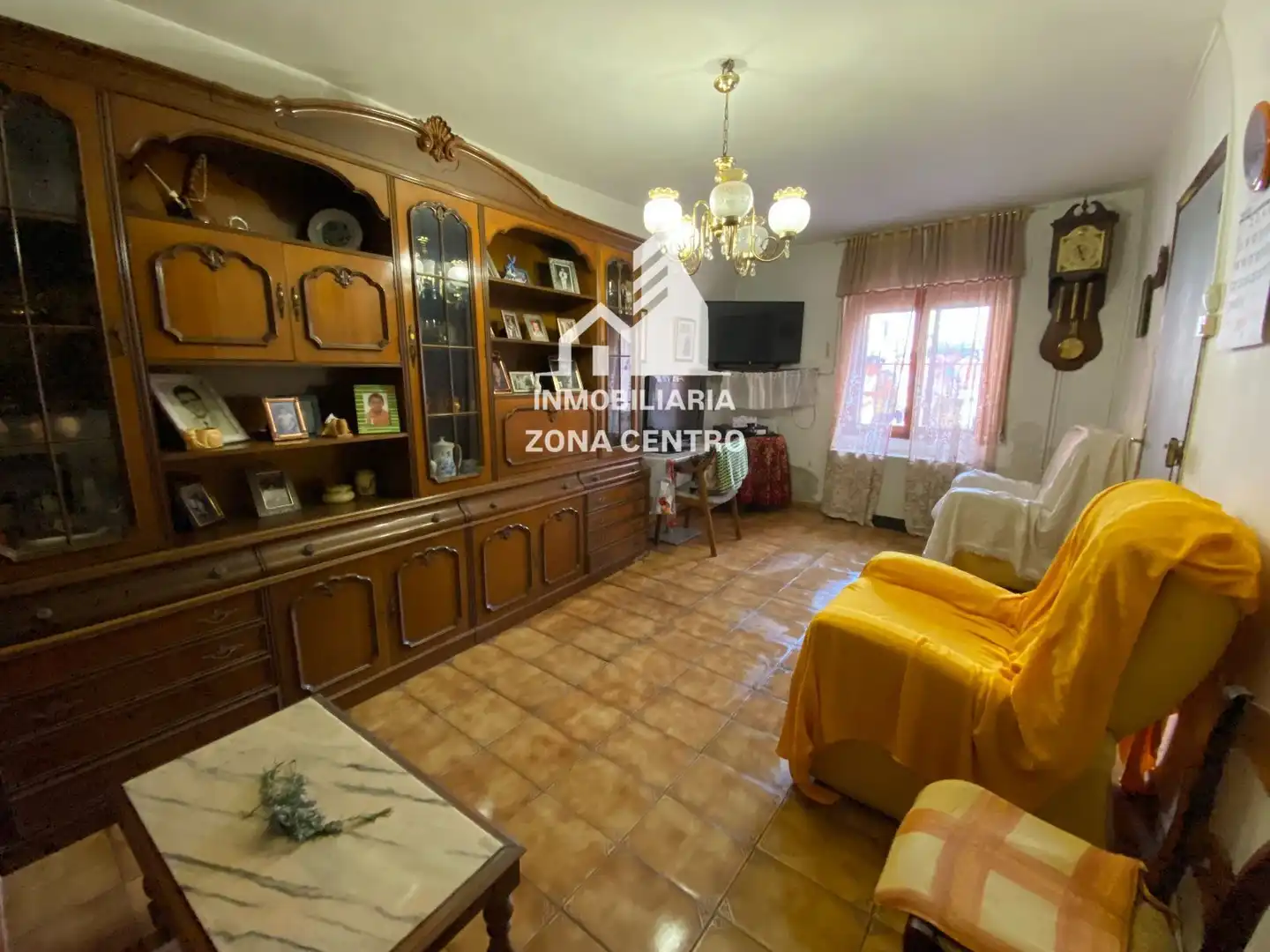 Sala de estar de Casa adosada en venta en Baltanás con Calefacción, Jardín privado y Amueblado