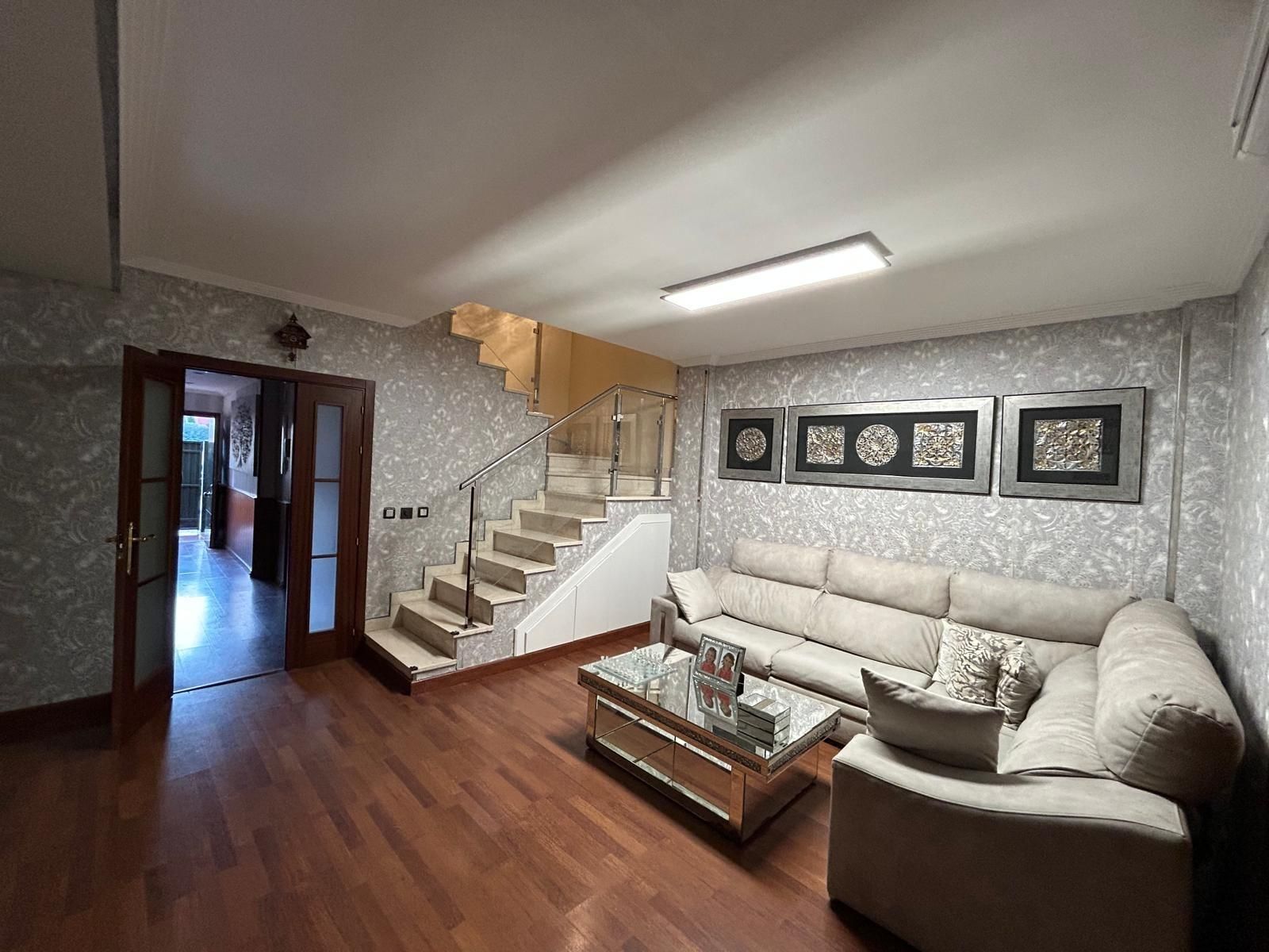 Living room of Single-family semi-detached for sale in Alcalá de Guadaira  with Private garden, Parquet flooring and Terrace