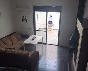 Living room of Flat for sale in El Pedroso  with Air Conditioner and Storage room