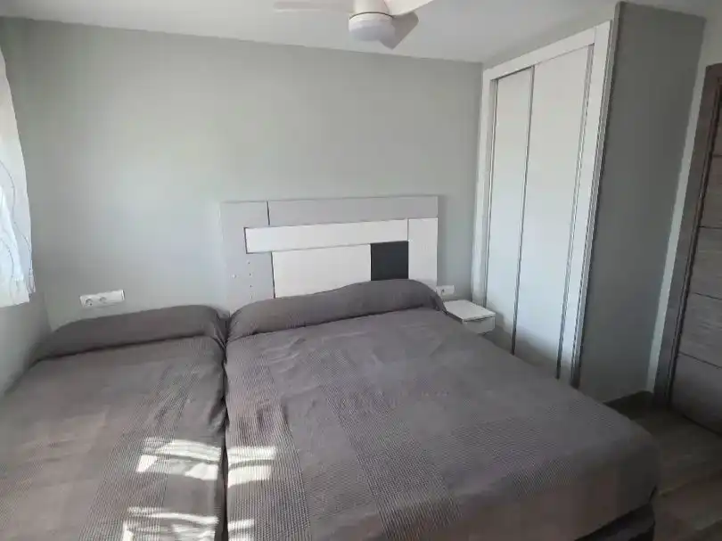 Schlafzimmer von Wohnung zur Miete in Gandia mit Klimaanlage, Schwimmbad und Möbliert