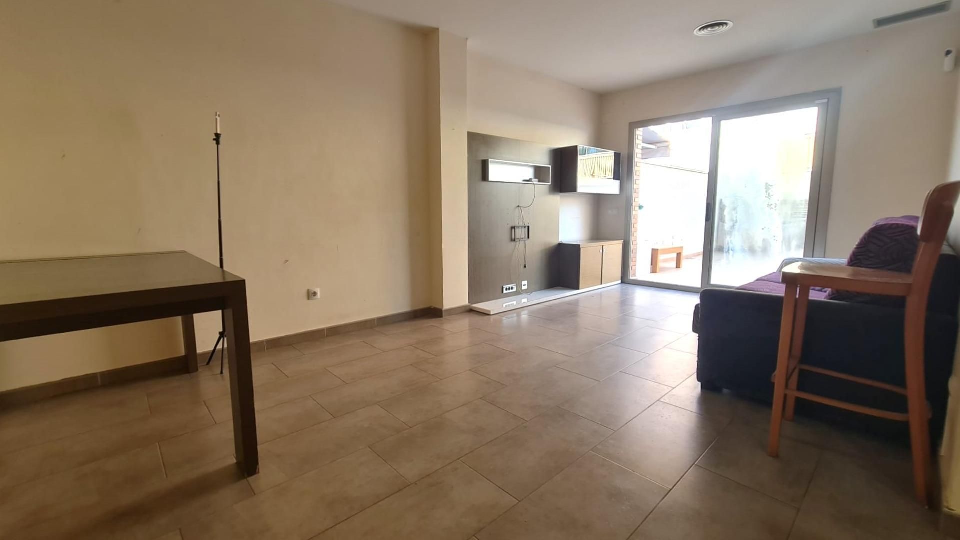 Living room of Planta baja for sale in El Vendrell  with Air Conditioner, Terrace and Alarm