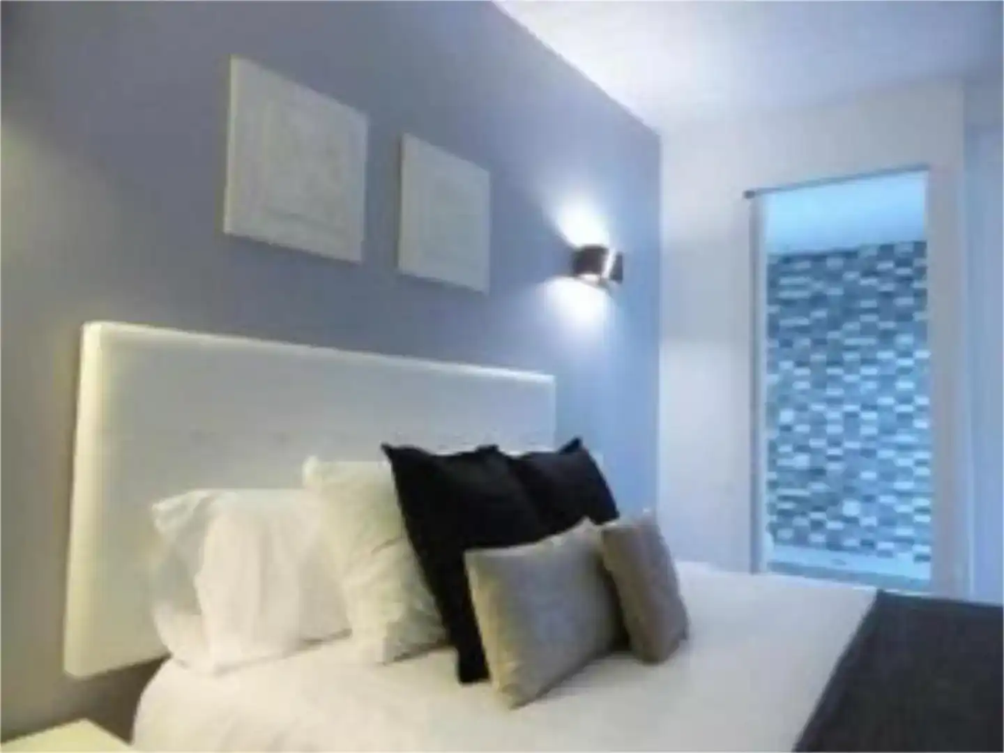 Dormitori de Apartament de lloguer en La Oliva amb Aire condicionat