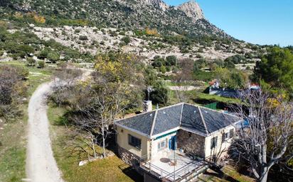 Exterior view of House or chalet for sale in La Cabrera  with Heating, Private garden and Terrace