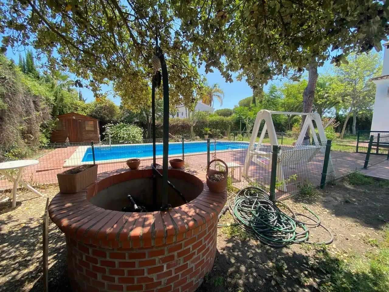 Swimming pool of Houses for sale in Aljaraque  with Air Conditioner, Private garden and Storage room