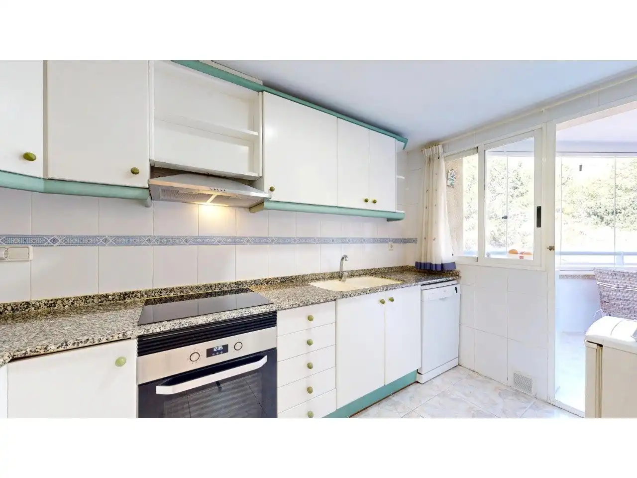 Kitchen of Flat for sale in Cullera  with Air Conditioner, Private garden and Terrace