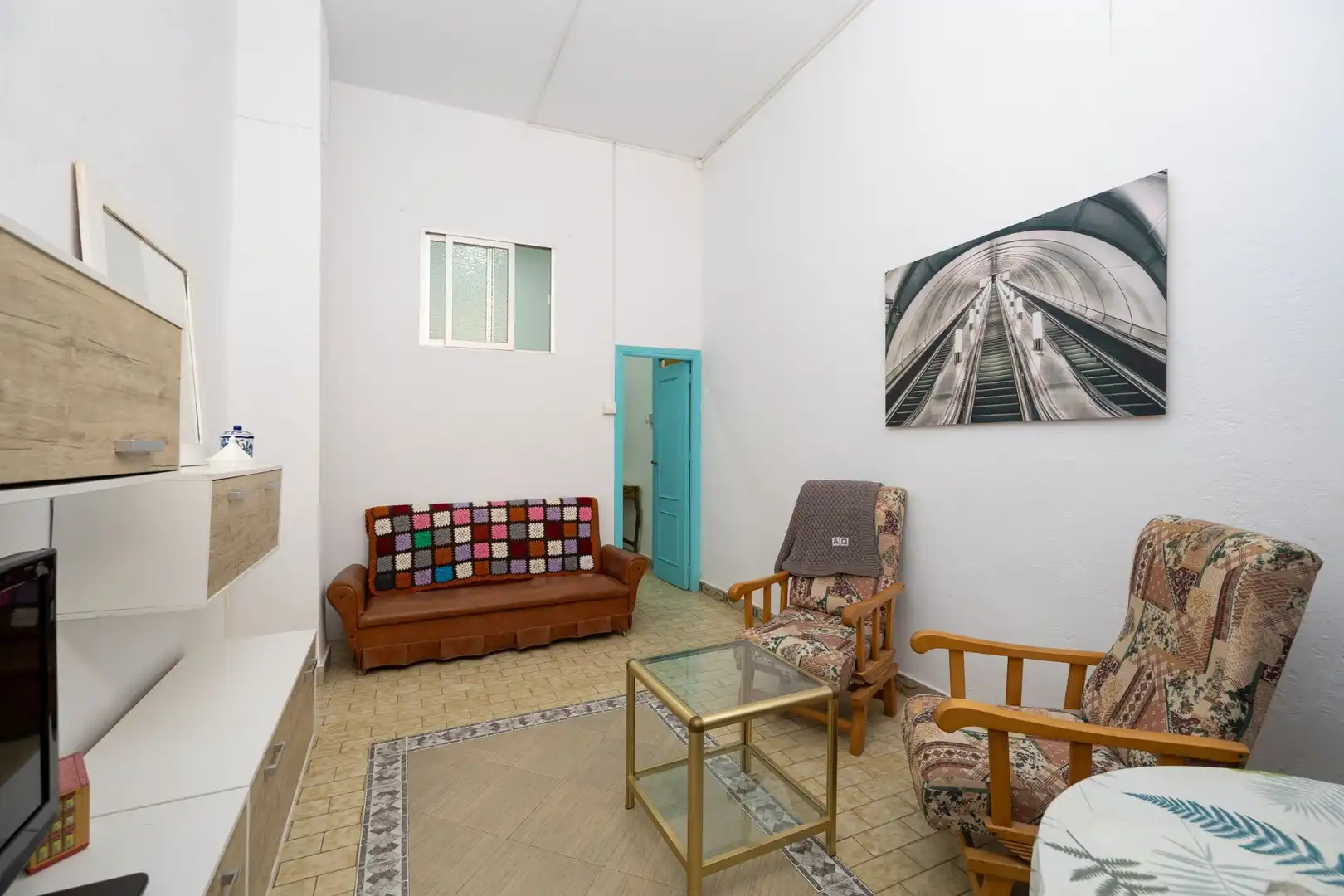 Sala de estar de Casa adosada en venta en Motril con Aire acondicionado, Calefacción y Terraza