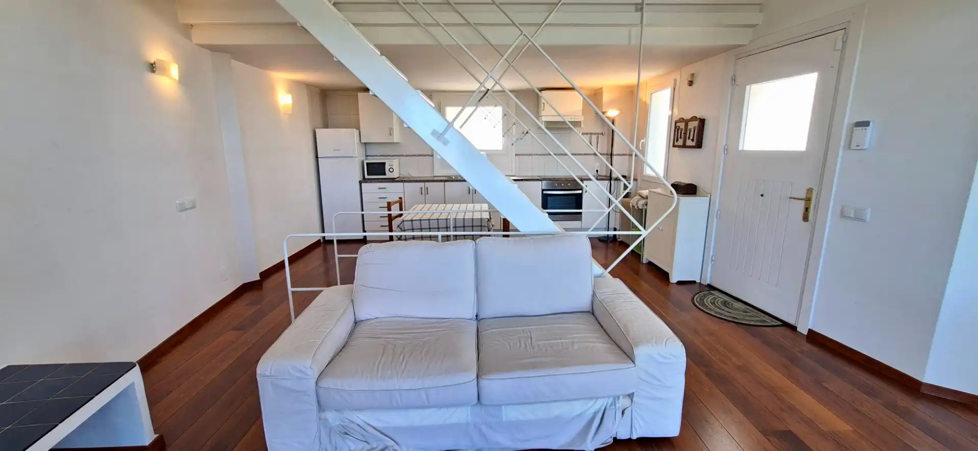 Sala de estar de Casa adosada en venta en Begur con Aire acondicionado, Calefacción y Jardín privado