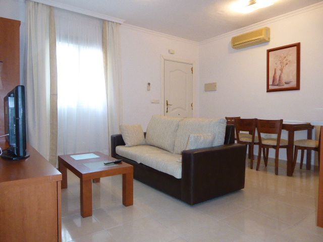 Sala d'estar de Apartament de lloguer en Málaga Capital amb Aire condicionat, Moblat i Rentadora
