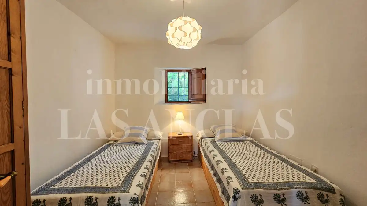 Dormitori de Finca rústica en venda en Santa Eulària des Riu amb Calefacció, Terrassa i Traster