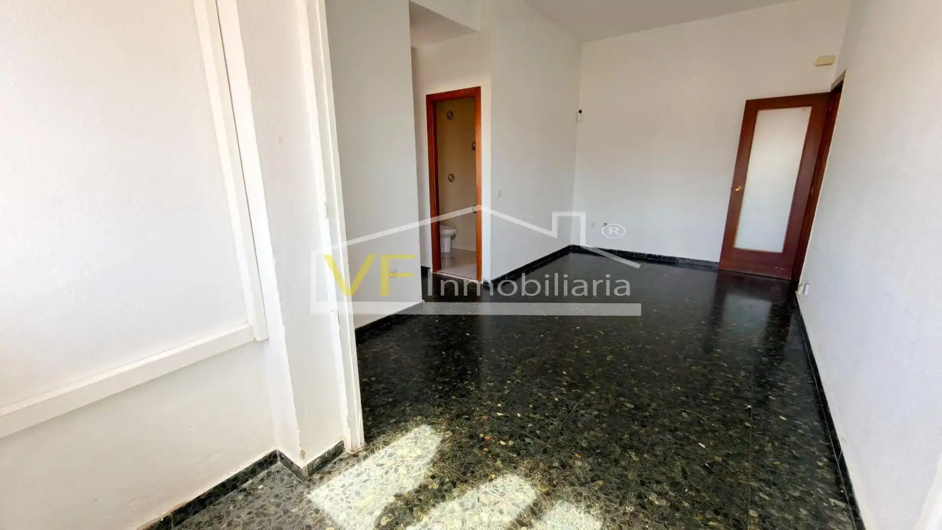 Sala de estar de Piso en venta en Málaga con Balcón y Piscina comunitaria
