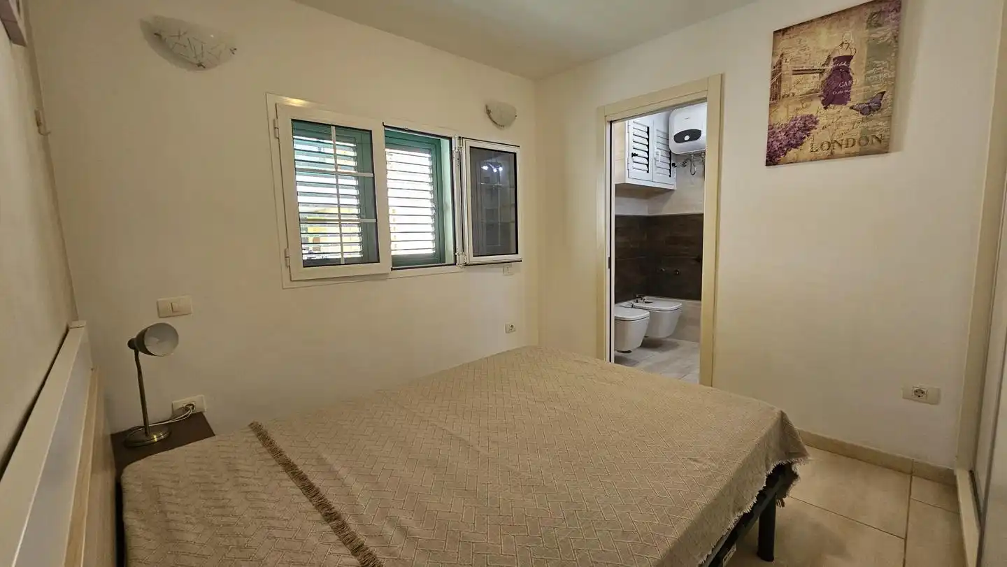 Bedroom of Flat for sale in San Bartolomé de Tirajana  with Air Conditioner, Furnished and Community pool