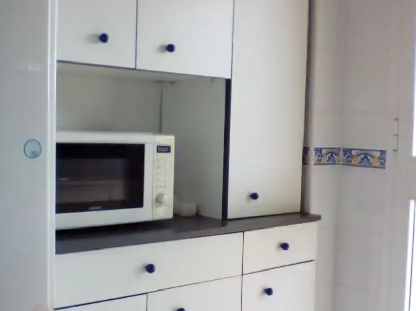 Cuina de Pis de lloguer en Chipiona amb Piscina i Moblat