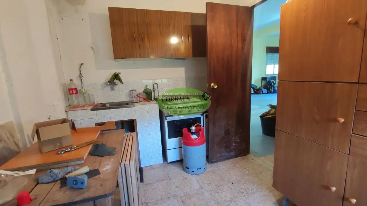 Cuina de Casa o xalet en venda en Cortegada amb Calefacció, Jardí privat i Parquet