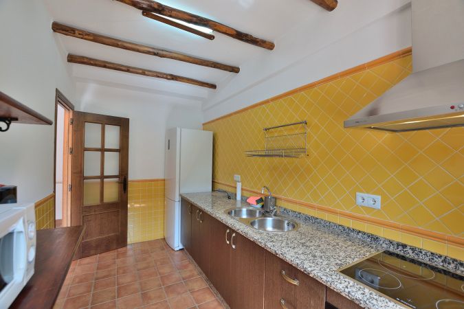 Cuina de Casa adosada en venda en Jimera de Líbar amb Aire condicionat, Terrassa i Moblat