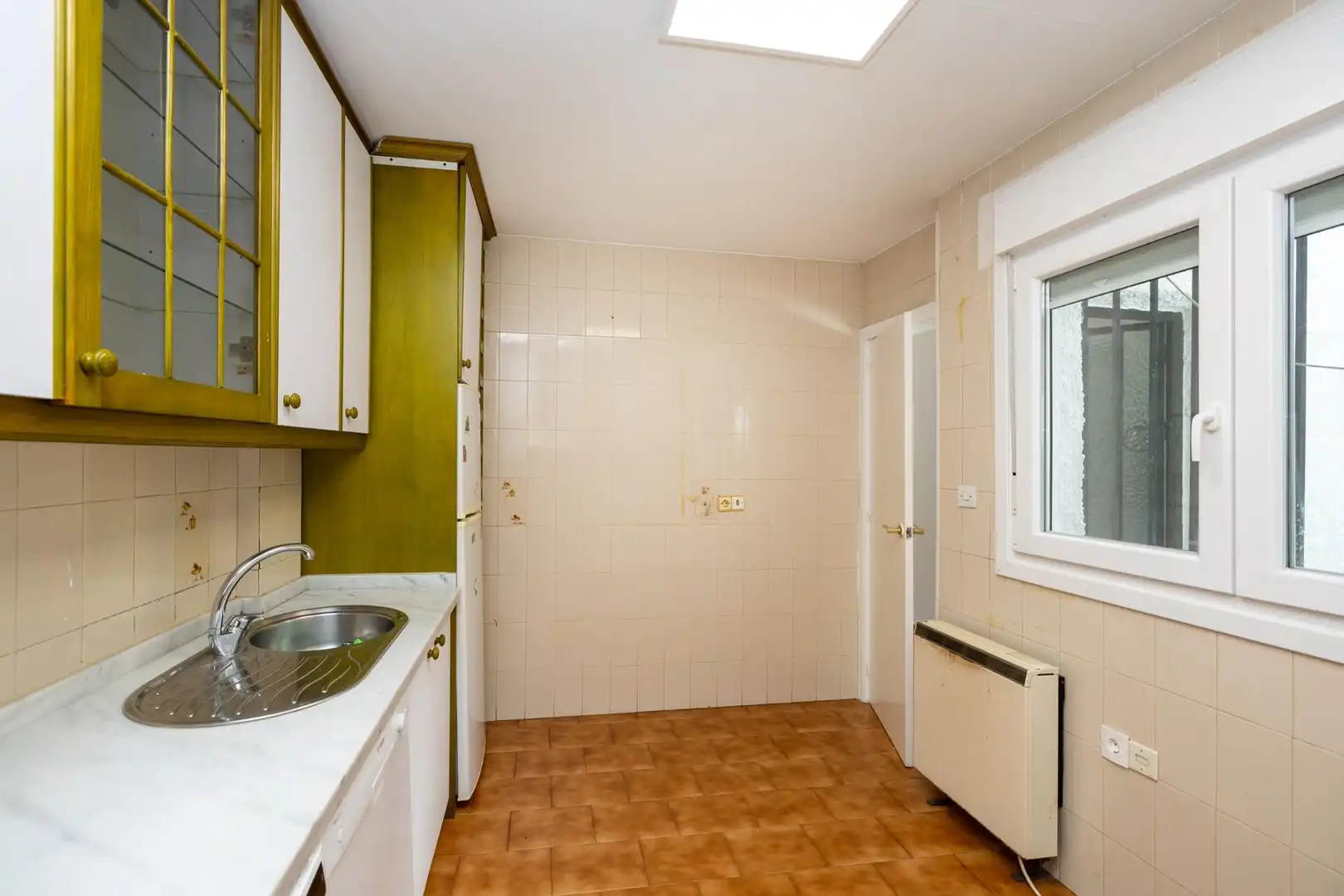 Cocina de Casa adosada en venta en Ogíjares con Aire acondicionado, Calefacción y Jardín privado