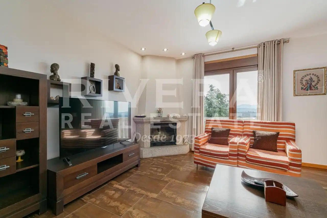 Sala de estar de Casa o chalet en venta en O Rosal   con Calefacción, Jardín privado y Terraza