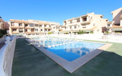 Swimming pool of Single-family semi-detached for sale in Guardamar del Segura  with Terrace and Balcony