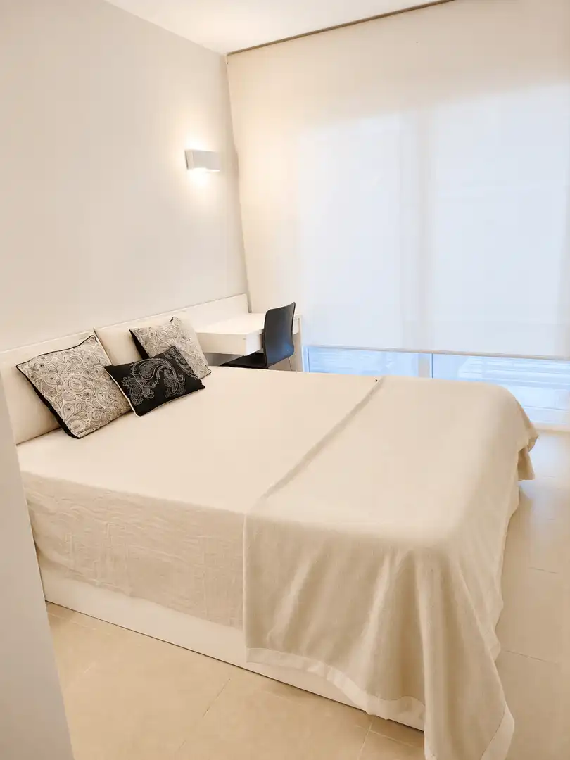 Dormitori de Apartament de lloguer en Castell d'Aro, Platja d'Aro i s'Agaró amb Aire condicionat i Piscina