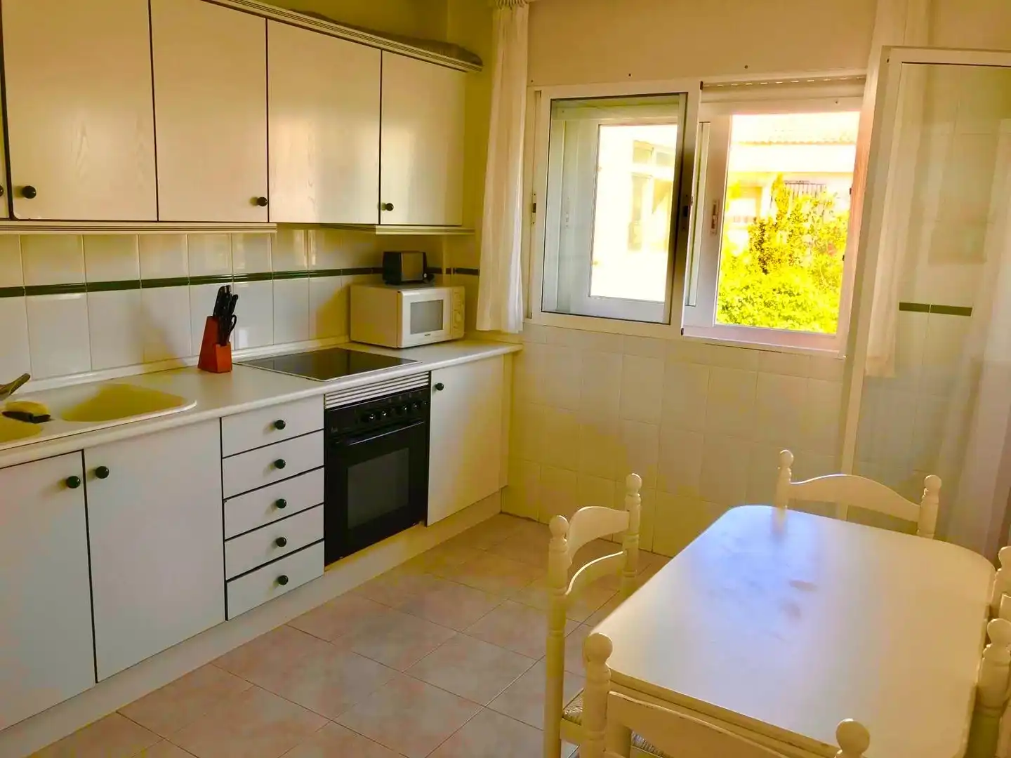 Cuina de Dúplex de lloguer en La Manga del Mar Menor amb Terrassa, Piscina i Moblat