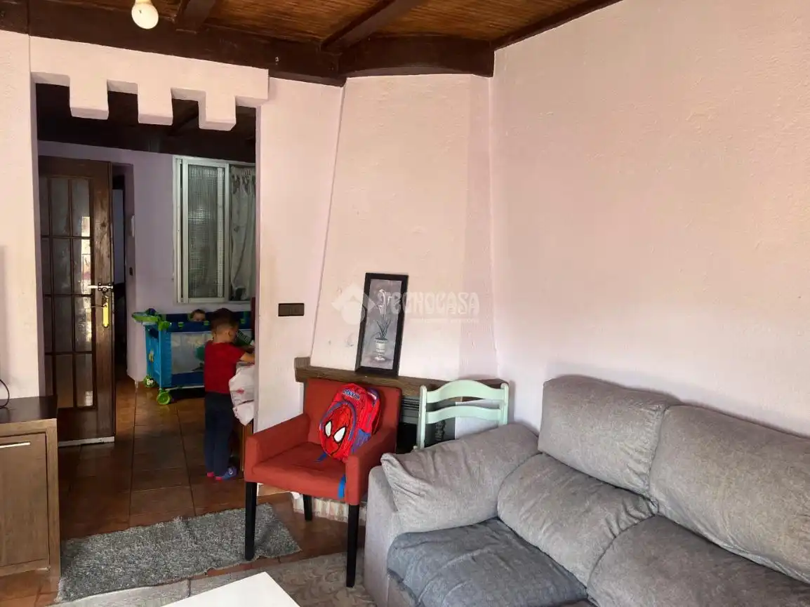 Sala de estar de Casa adosada en venta en Sayalonga
