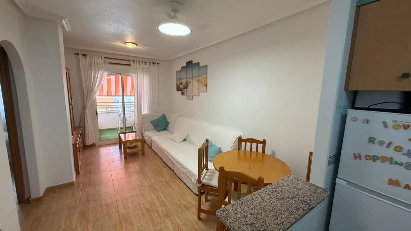 Sala de estar de Apartamento en venta en La Manga del Mar Menor con Aire acondicionado, Terraza y Piscina