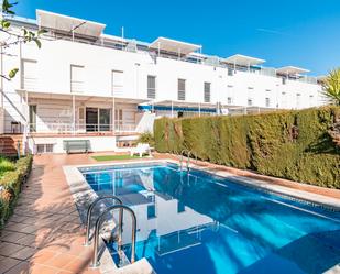 Swimming pool of Single-family semi-detached for sale in  Granada Capital  with Air Conditioner, Heating and Terrace