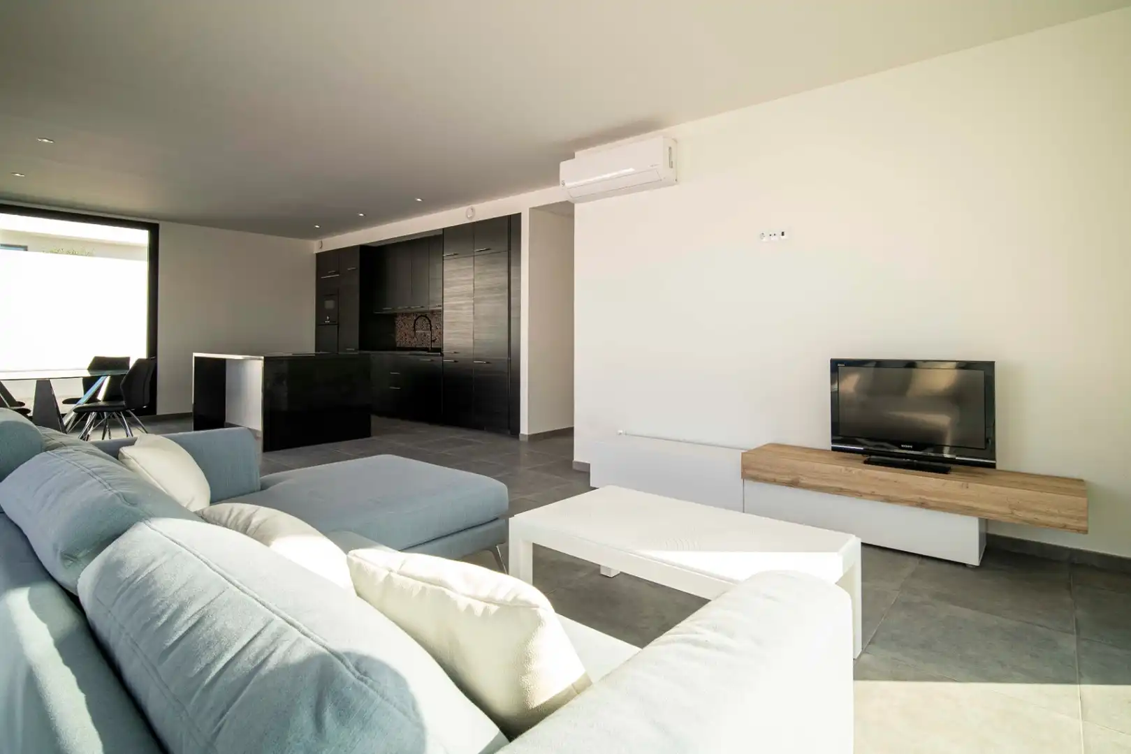 Sala de estar de Casa o chalet en venta en L'Alfàs del Pi con Aire acondicionado, Calefacción y Jardín privado