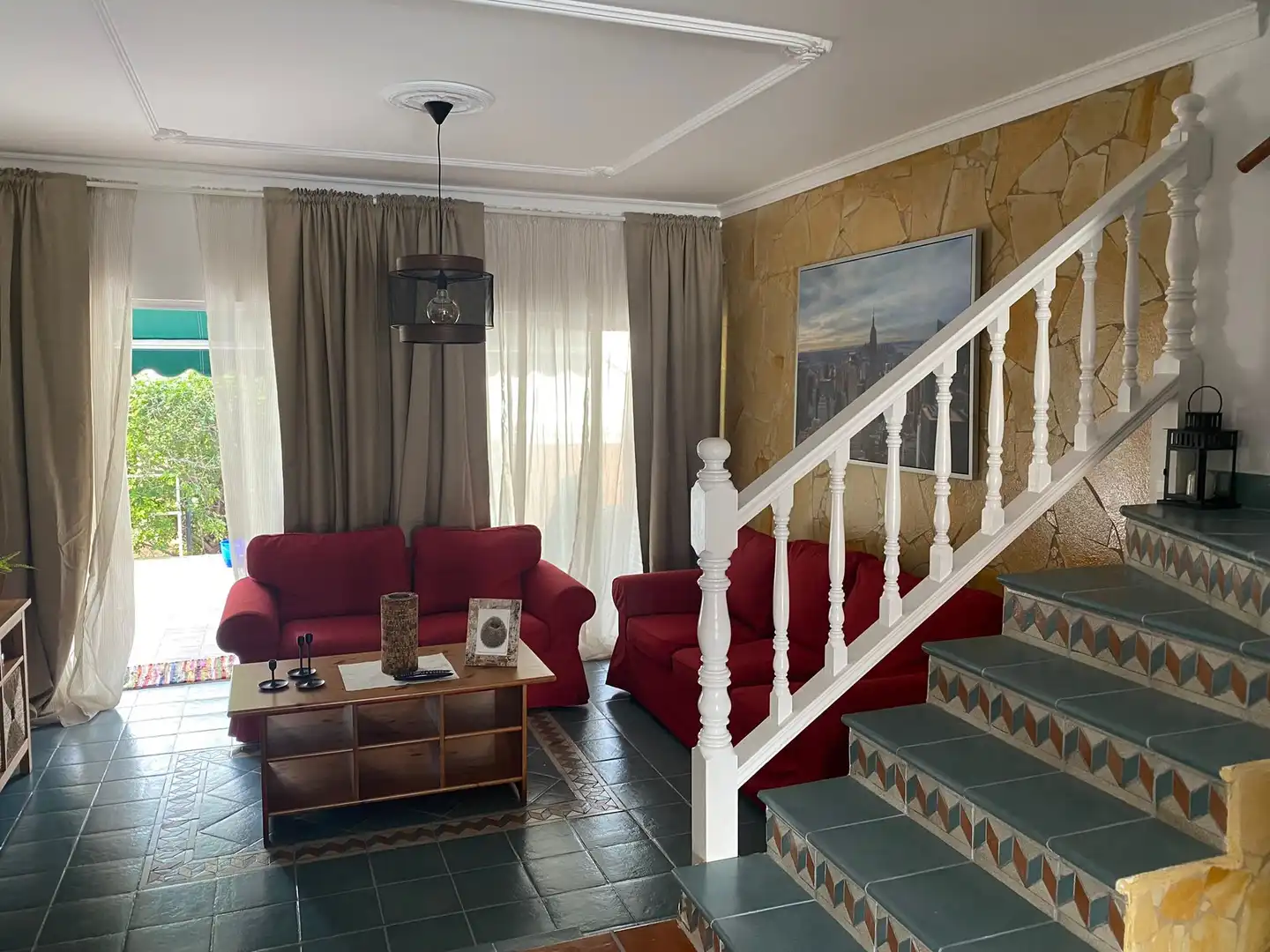 Sala d'estar de Casa adosada en venda en Mogán amb Aire condicionat, Terrassa i Traster