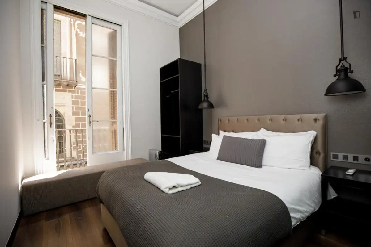 Schlafzimmer von Wohnungen zur Miete in Barcelona mit Klimaanlage, Heizung und Möbliert